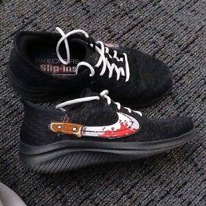 Skechers Black Slip-Ins with Knife Graphic